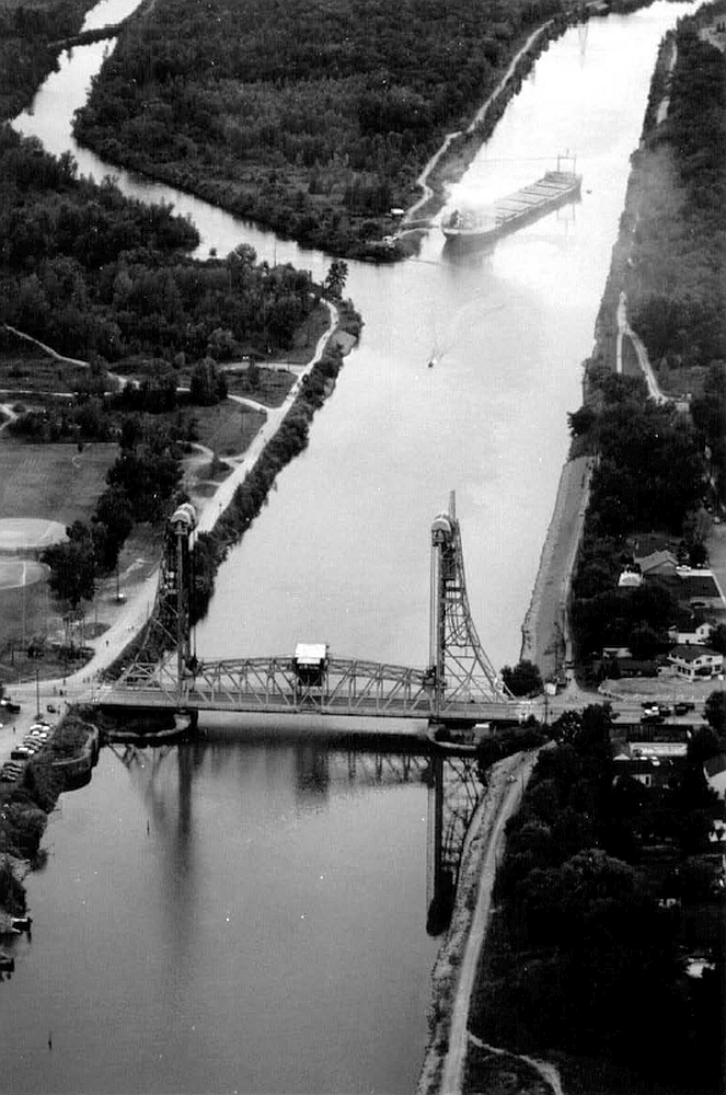 Photo 2. Aerial view looking north at the bridge and vessel after the striking. (Photograph by Harry Rosettani)