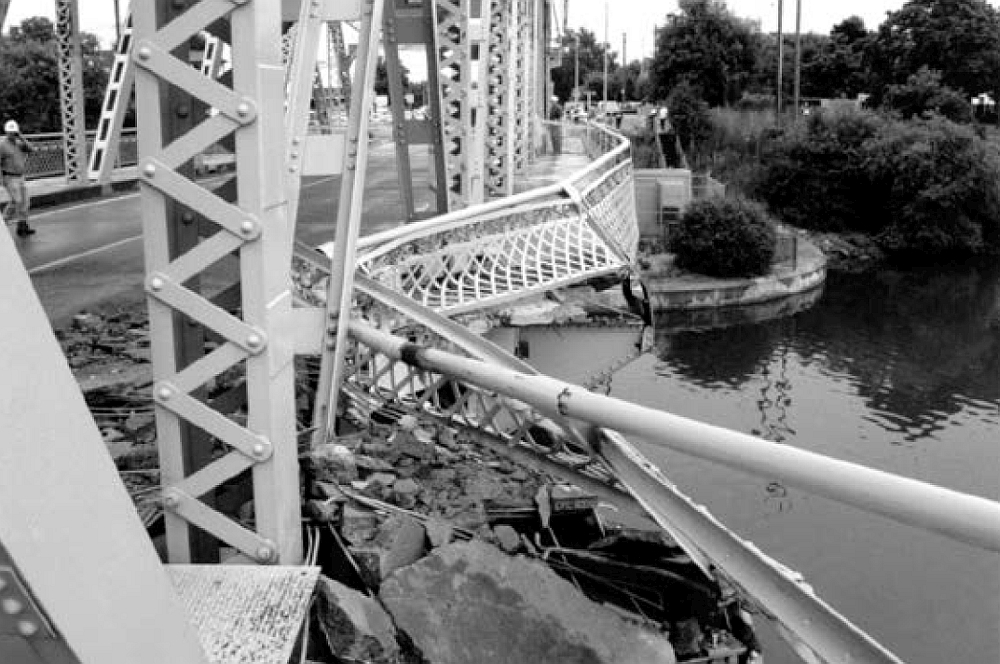 Photo 5. Damage to Bridge 11